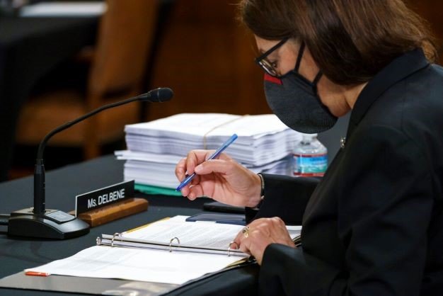 U.S. Rep. Suzan DelBene, D-Washington, goes over documents at the Capitol on Tuesday as the House Ways and Means Committee worked on a sweeping Democratic proposal for $3.5 trillion of domestic rebuilding investments. (Photo by J. Scott Applewhite / The Associated Press)